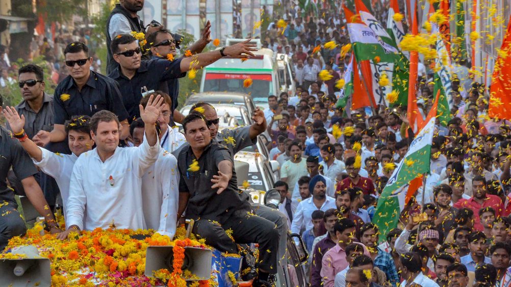 Jabalpur: Congress President Rahul Gandhi greets his supporters during a roadshow, in Jabalpur, Saturday, Oct 6, 2018. (PTI Photo) (PTI10_6_2018_000152B)